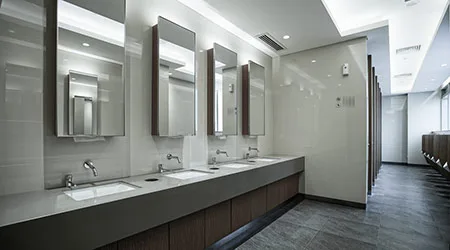 Empty institutional bathroom — deployment space for FlySense vape and tampering detection