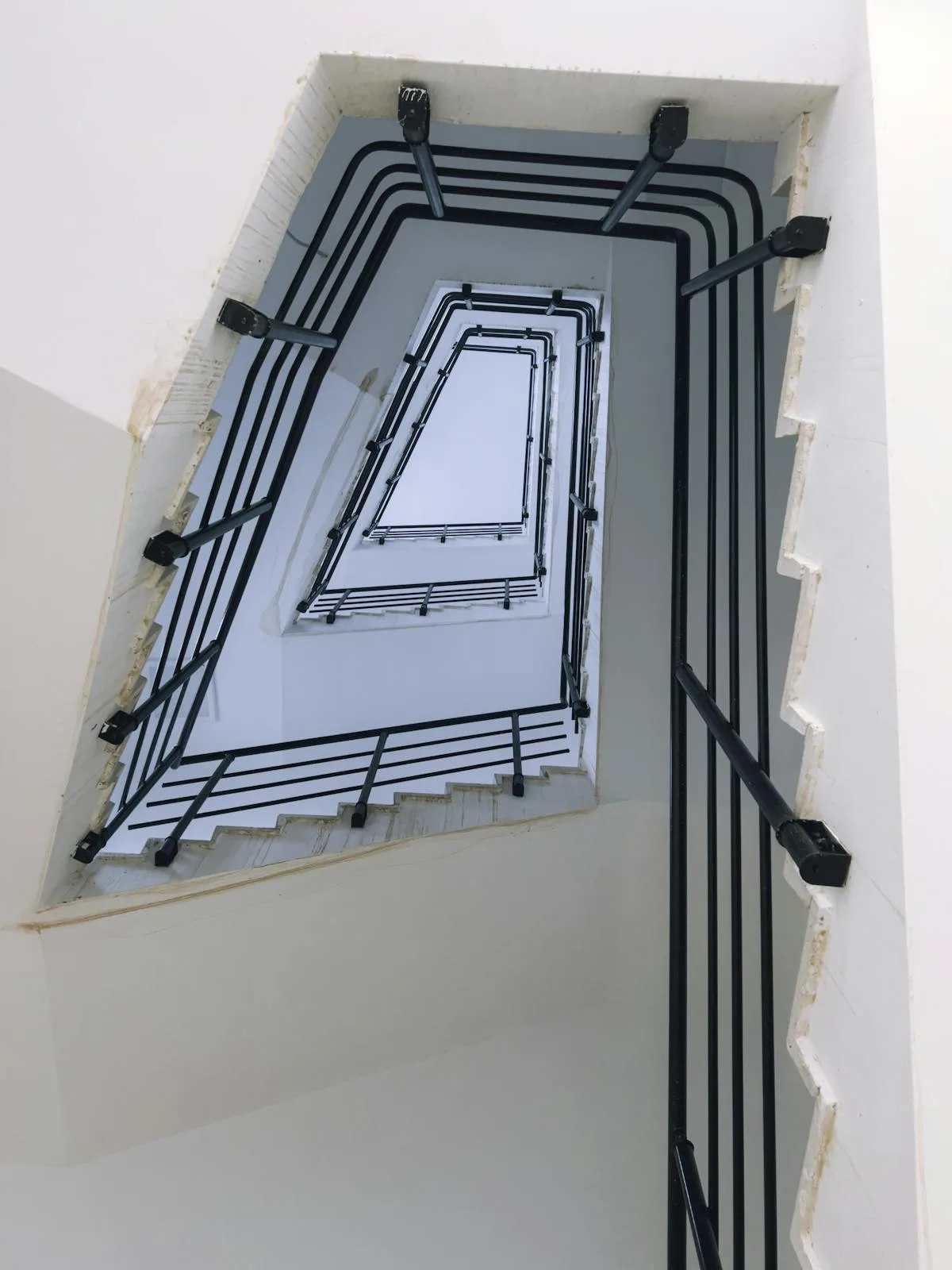 Looking down a spiral stairwell — stairwell deployment space